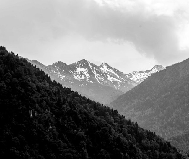 Black and white photo of mountains in the distance